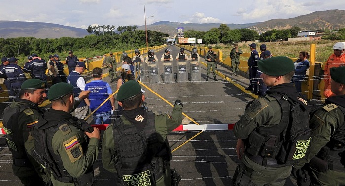 Venezuela-Colombian border partially reopens for truck passage